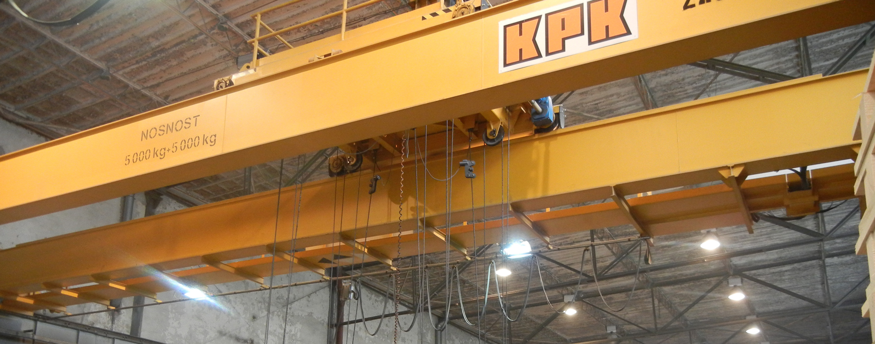 Double girder travelling cranes