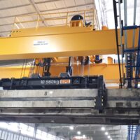 Double girder overhead crane in the production of concrete semi-finished products